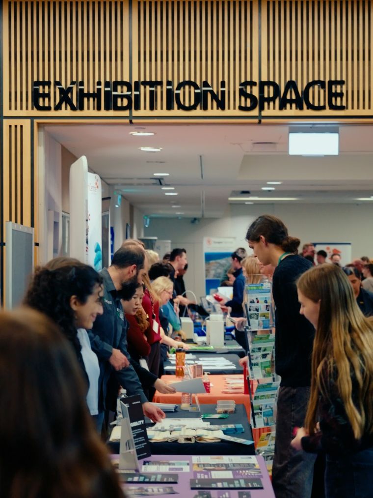 Students networking at an exhibition space event